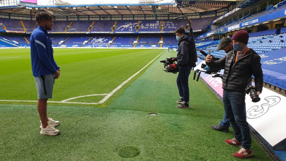 Filming a Chelsea player on the touchline
